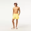 Lacoste Quick Dry badebukser til mænd med integreret for