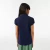 Lacoste mini-piqué-poloshirt med flæskekrave til piger