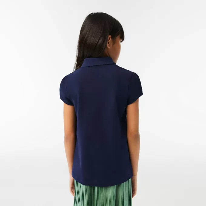 Lacoste mini-piqué-poloshirt med flæskekrave til piger