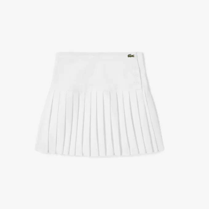 Piqué sportsnederdel med integrerede shorts