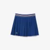 Piqué sportsnederdel med integrerede shorts
