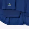 Piqué sportsnederdel med integrerede shorts