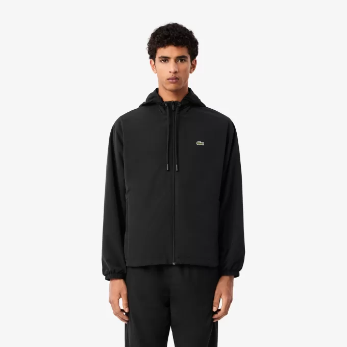 Sportsuitjakke med aftagelig hætte