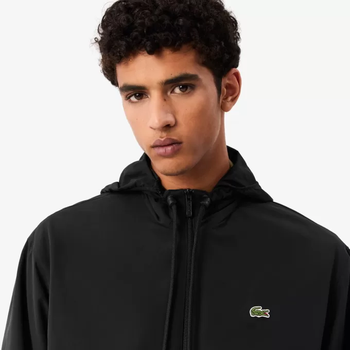 Sportsuitjakke med aftagelig hætte