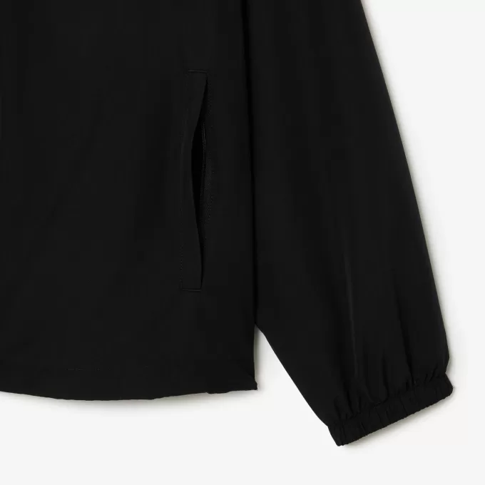 Sportsuitjakke med aftagelig hætte