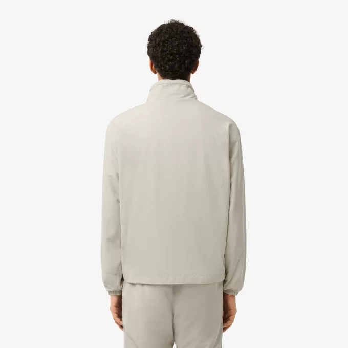 Sportsuitjakke med aftagelig hætte
