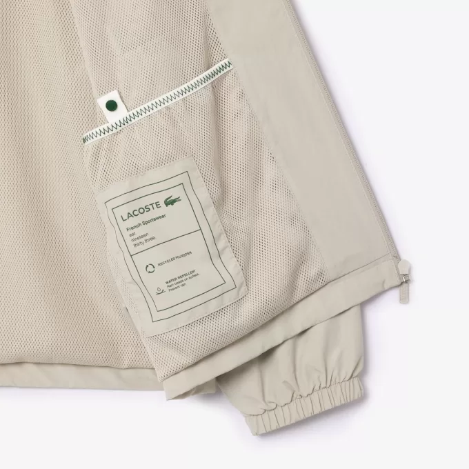 Sportsuitjakke med aftagelig hætte