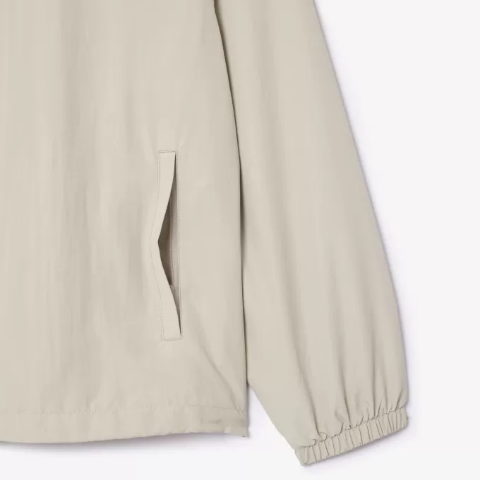 Sportsuitjakke med aftagelig hætte