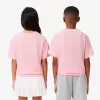 T-shirt med broderet blomster med tryk