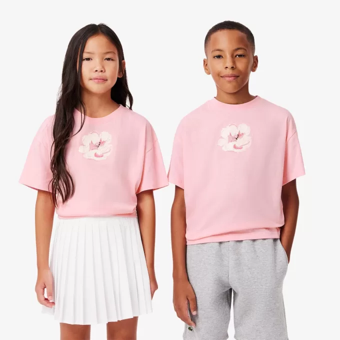 T-shirt med broderet blomster med tryk